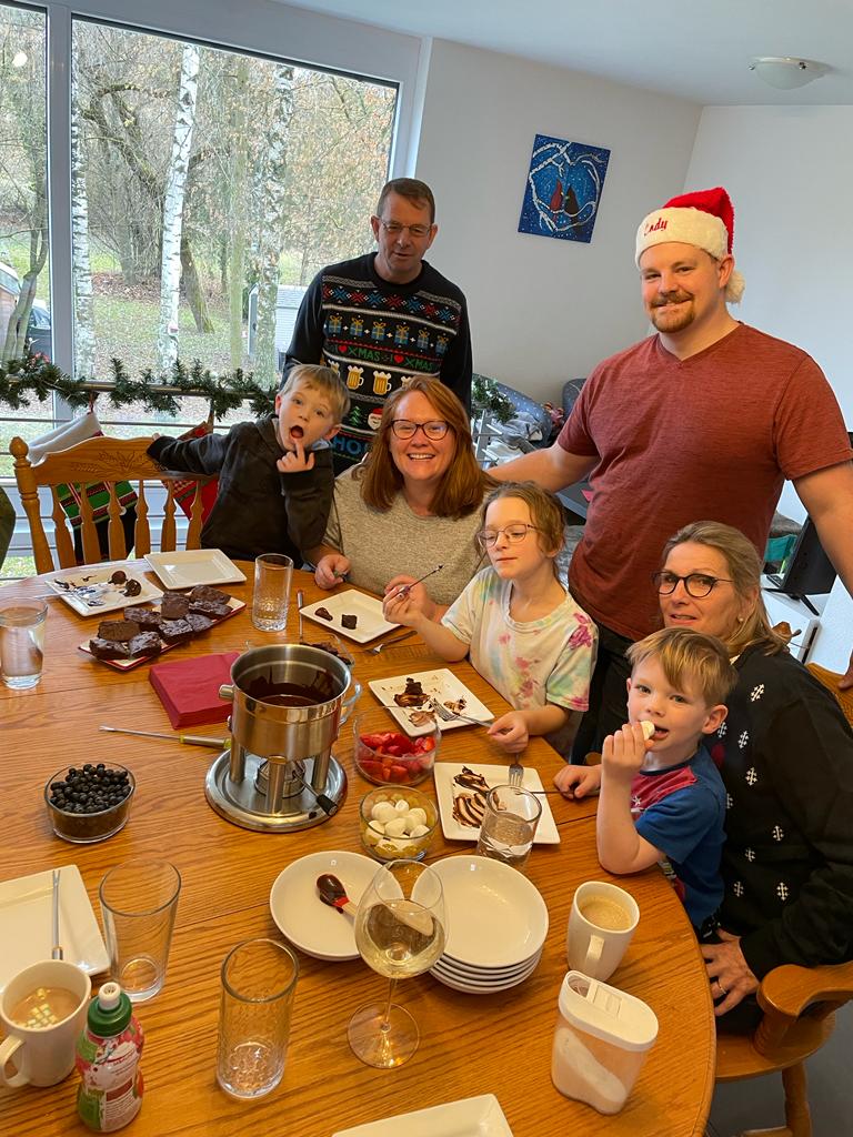 The Fry family gathering around food